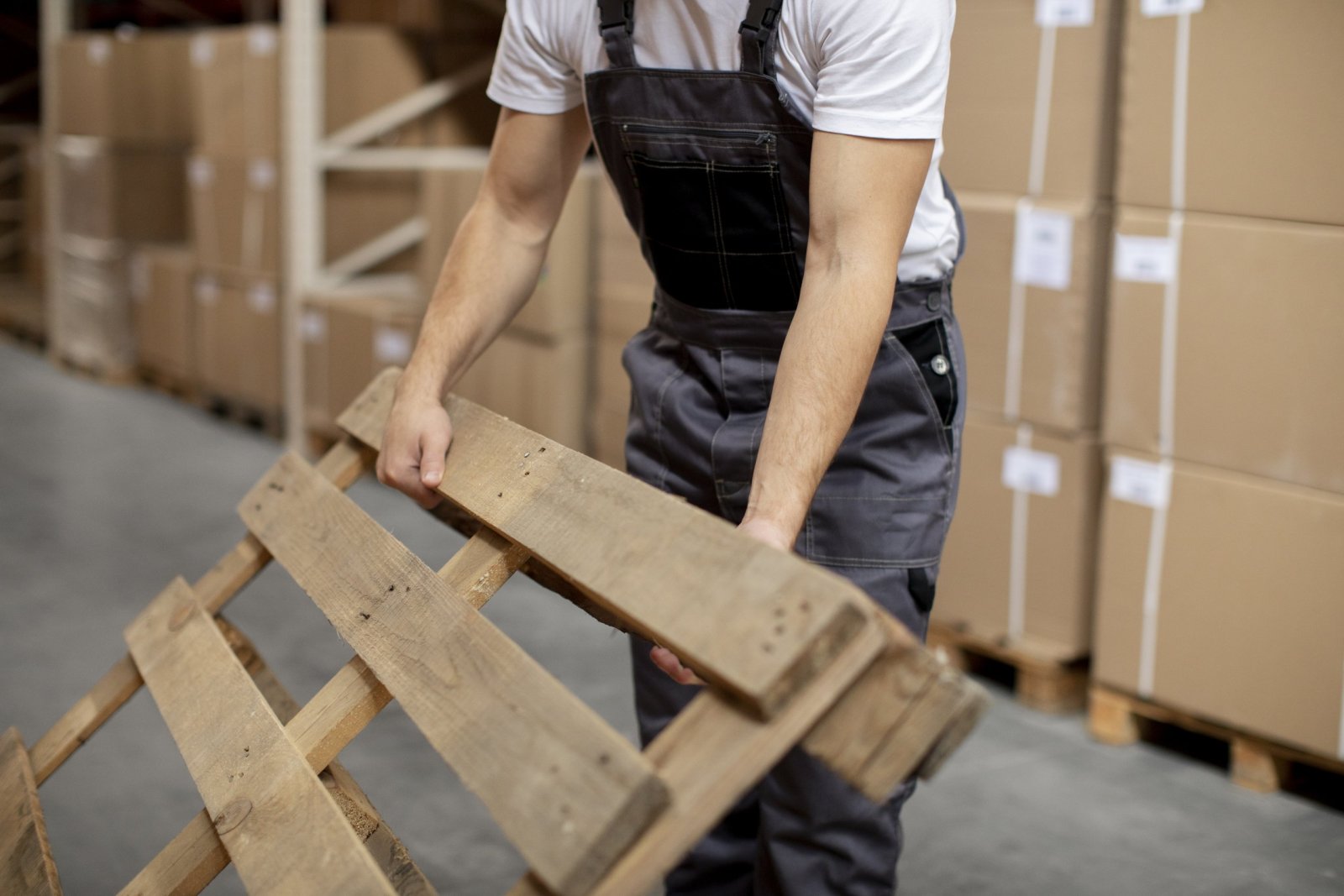 close-up-hands-holding-wooden-item